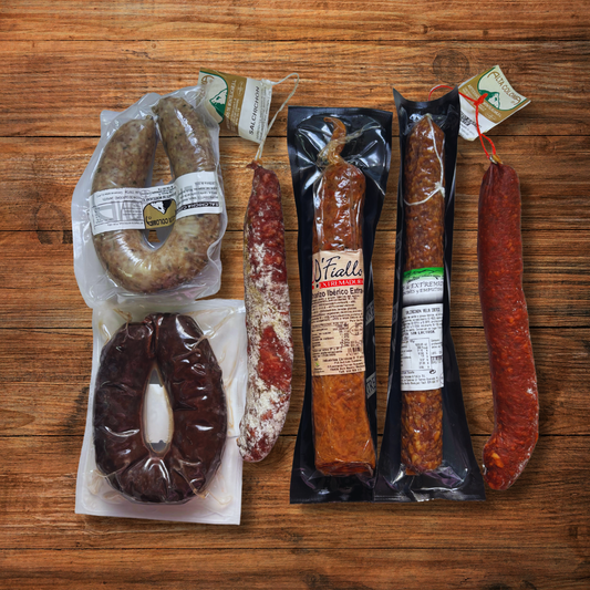 Pack Corte Tradicional con embutidos caseros e ibéricos sobre tabla